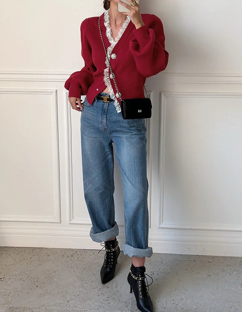 Knit cardigan styled with trousers for a feminine semi-dressy café outfit.