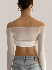 Sheer cropped top styled with jeans