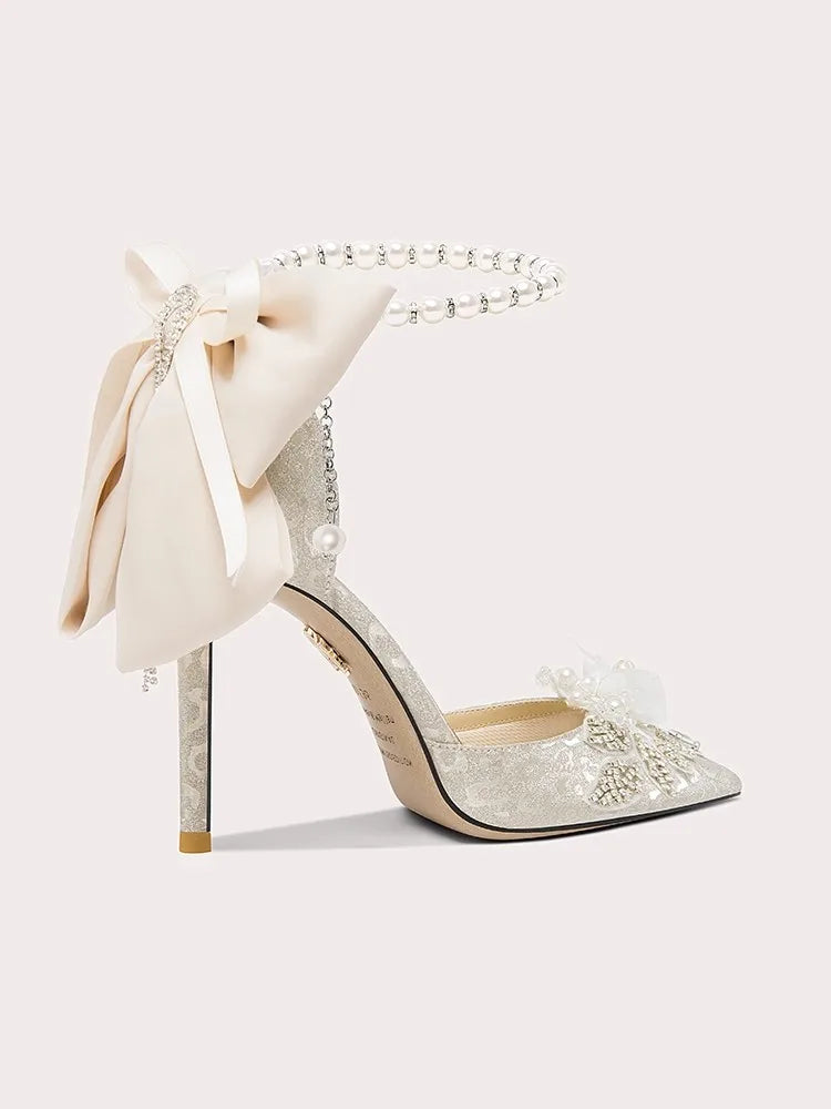 Lace bridal sandals featuring pearl ankle strap and big bow