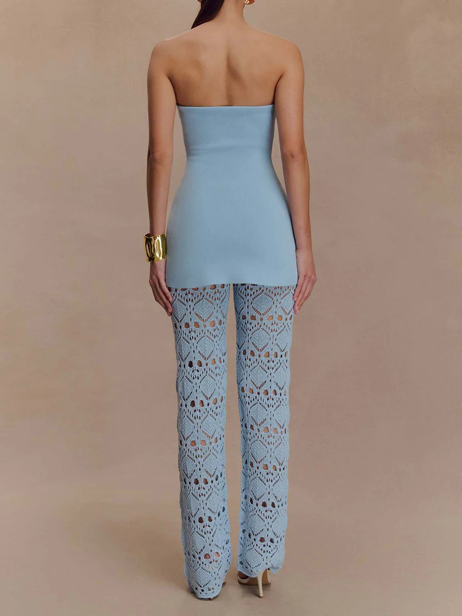 Blue peplum top paired with hollow knit pants for summer fashion