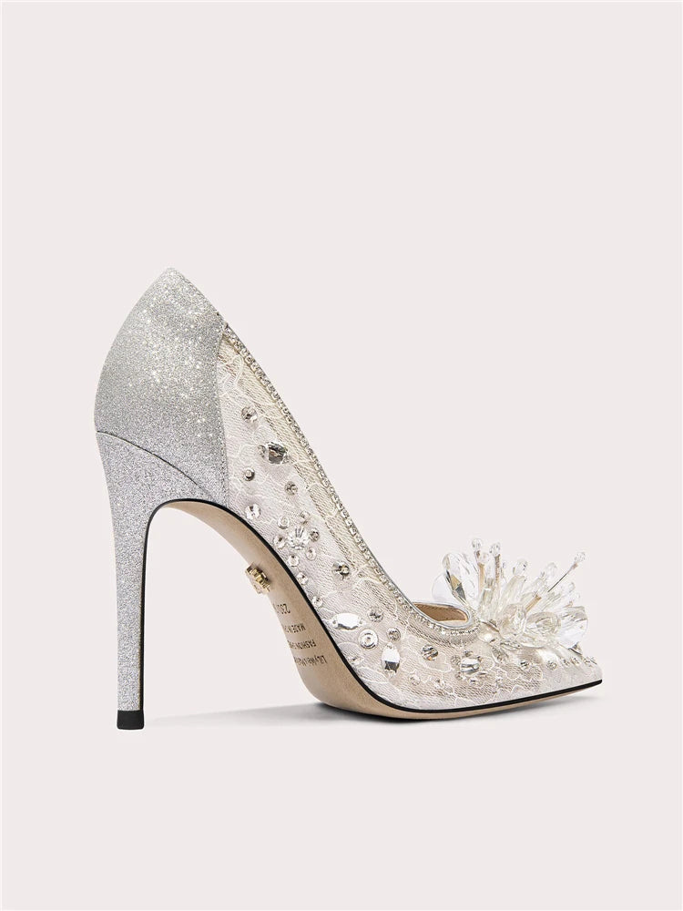 Close-up of sequin mesh pointed toe crystal pumps