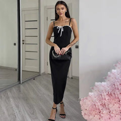 Slim sheath silhouette black evening gown with lace details