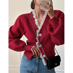 Woman wearing lace trim knit cardigan styled with denim for relaxed layering.