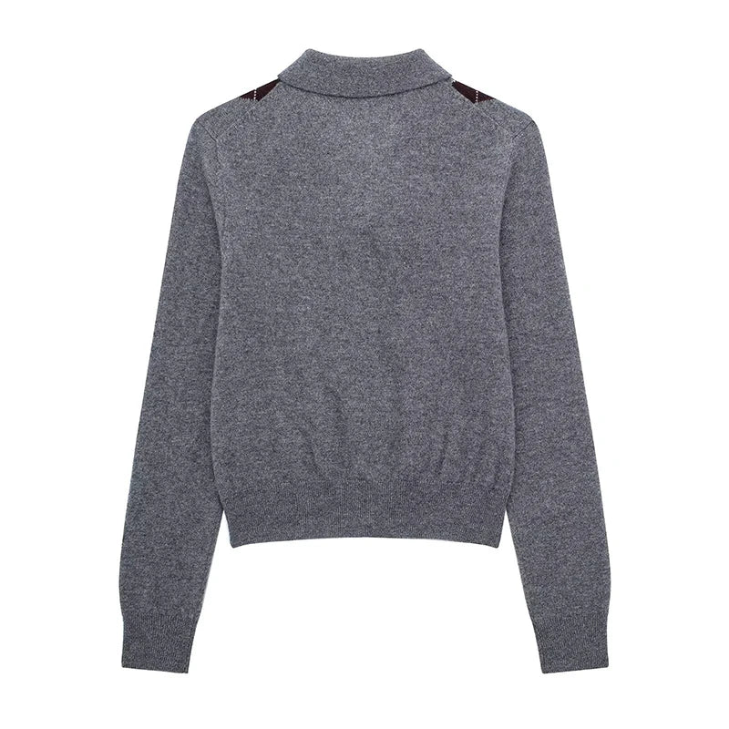 Patterned knit cardigan paired with relaxed trousers for weekday styling