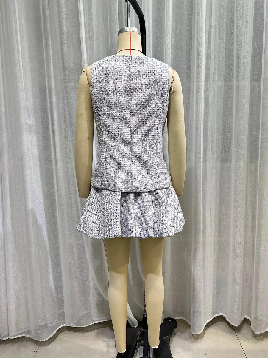 Layered mini skirt and woven top perfect for modern autumn workwear