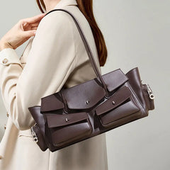 Cowhide shoulder bag with multi-pocket exterior