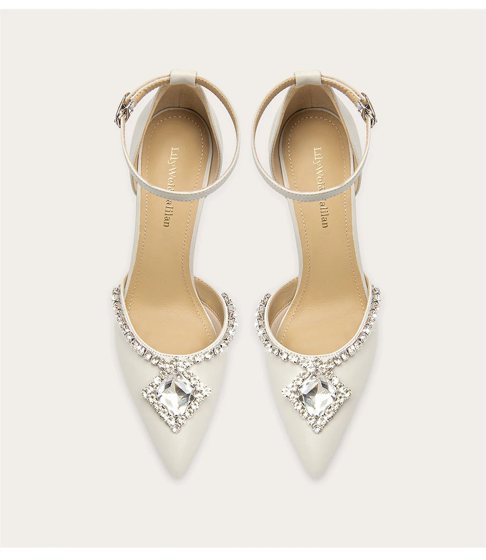 Leather pointed toe sandals with rhinestone embellishments