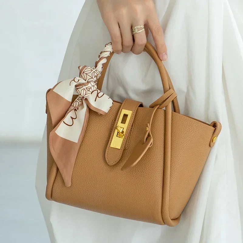 Leather shoulder crossbody bag with top handle and dual closure detail