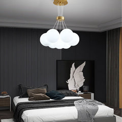 Artistic moon chandelier with color glass balls for statement home decor.
