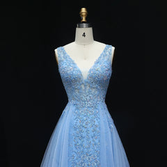 Full-length view of embellished A-line evening gown with clean hem