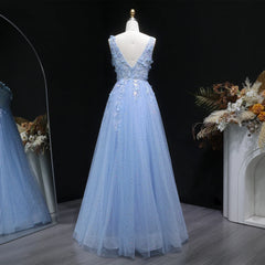 Close-up of the appliqué bodice detail on a sleeveless prom dress