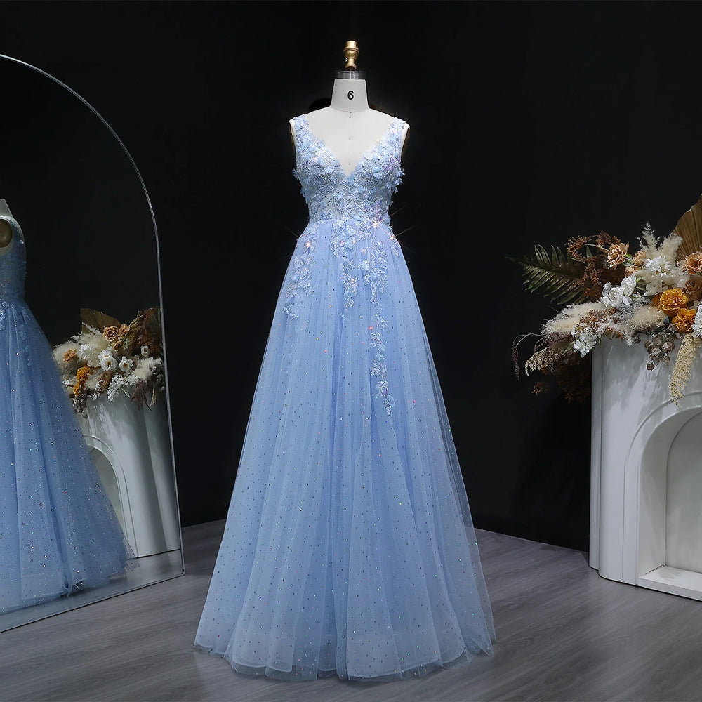 Full-length view of a backless A-line gown with airy tulle volume