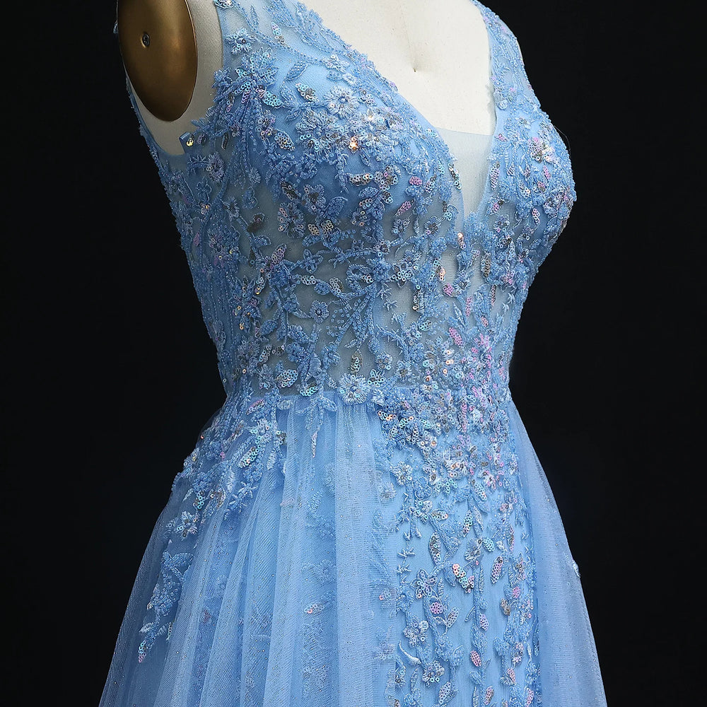 Detail view of illusion neckline and structured bodice on prom gown