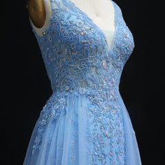 Detail view of illusion neckline and structured bodice on prom gown