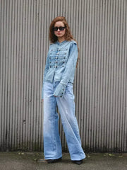 Short utility jacket styled as a clean everyday layering piece