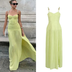 Pleated suspender maxi dress with high waist and flowing skirt