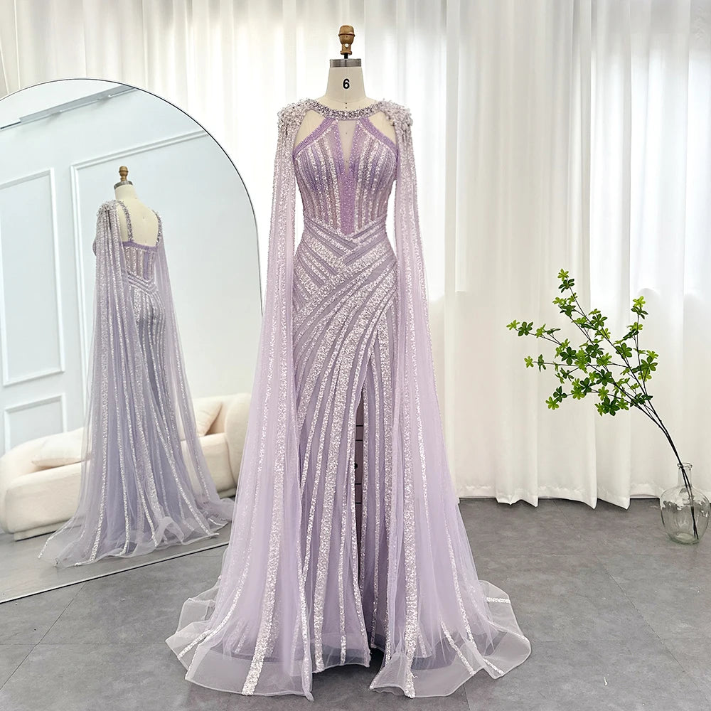 A woman wearing a lilac mermaid gown with a sparkling crystal and sequin bodice.