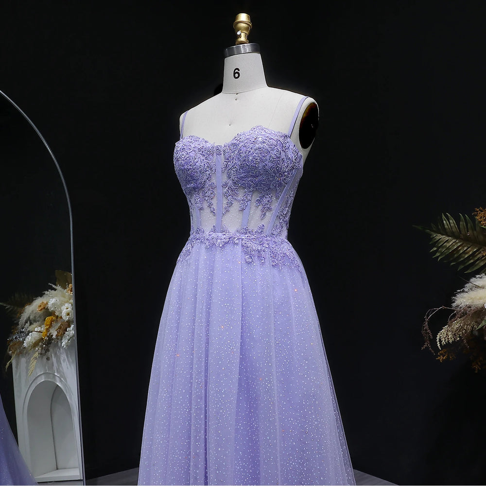 Close-up of sweetheart bodice with appliqué detail on tulle