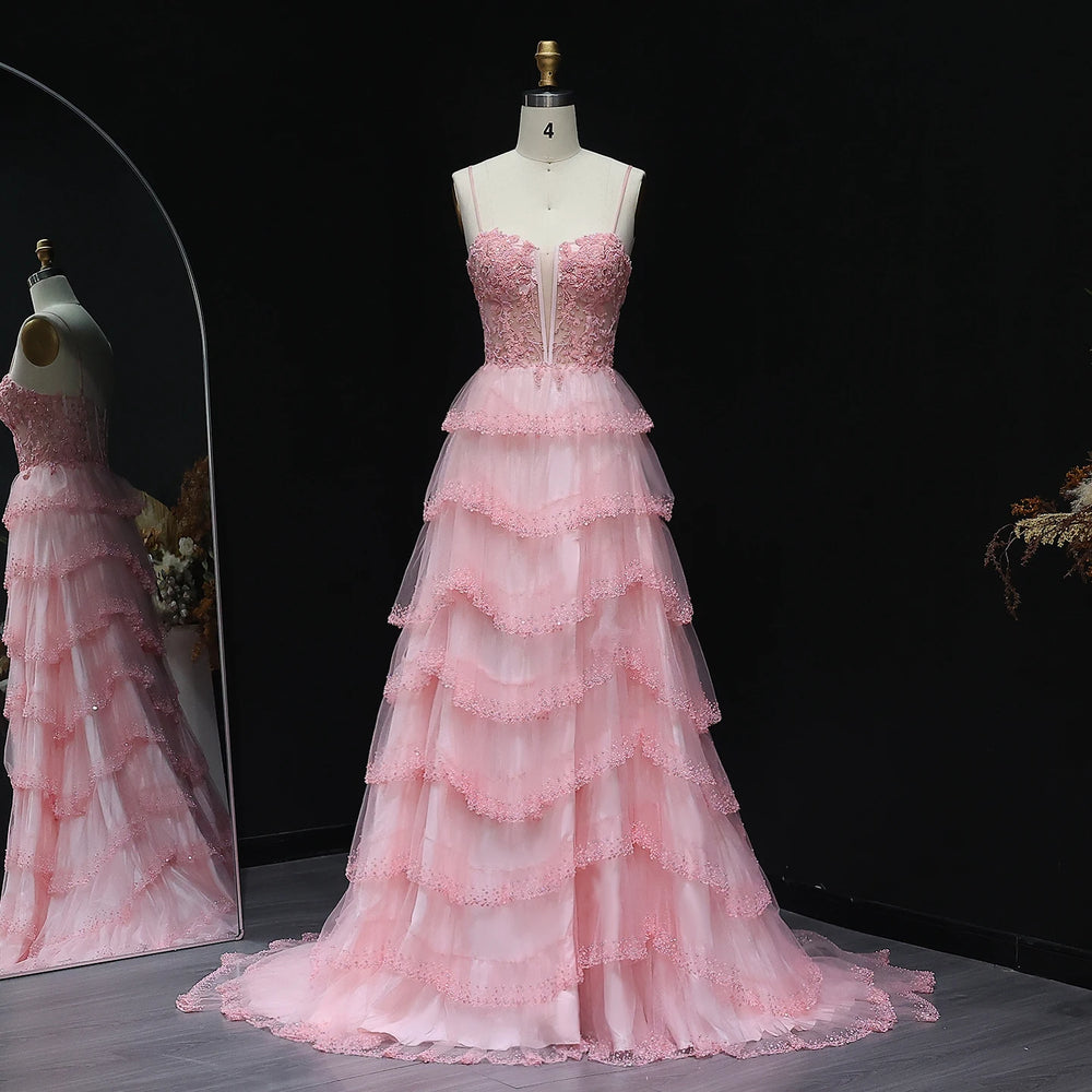 Tiered ruffle tulle A-line prom gown with sweetheart neckline on mannequin