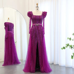 A full-length shot of the beaded formal dress, highlighting the elegant long sleeves.