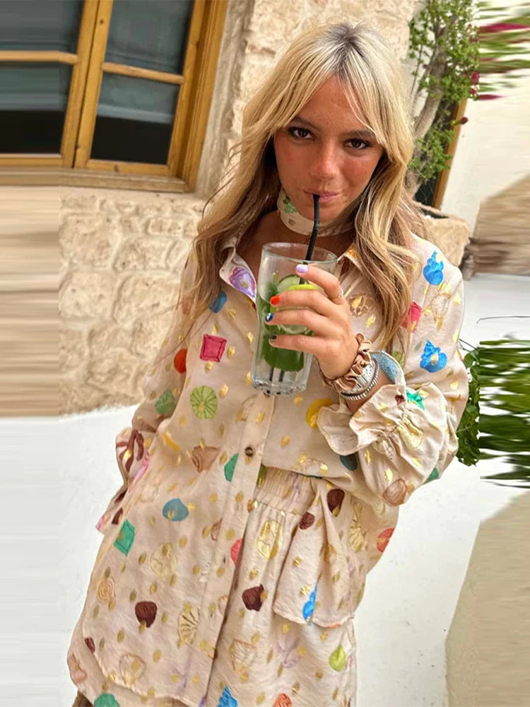 Side view showing relaxed shirt fit and elastic-waist shorts