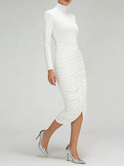 Full-length view showing the dress’s slim fit, long sleeves, and elegant midi length styling