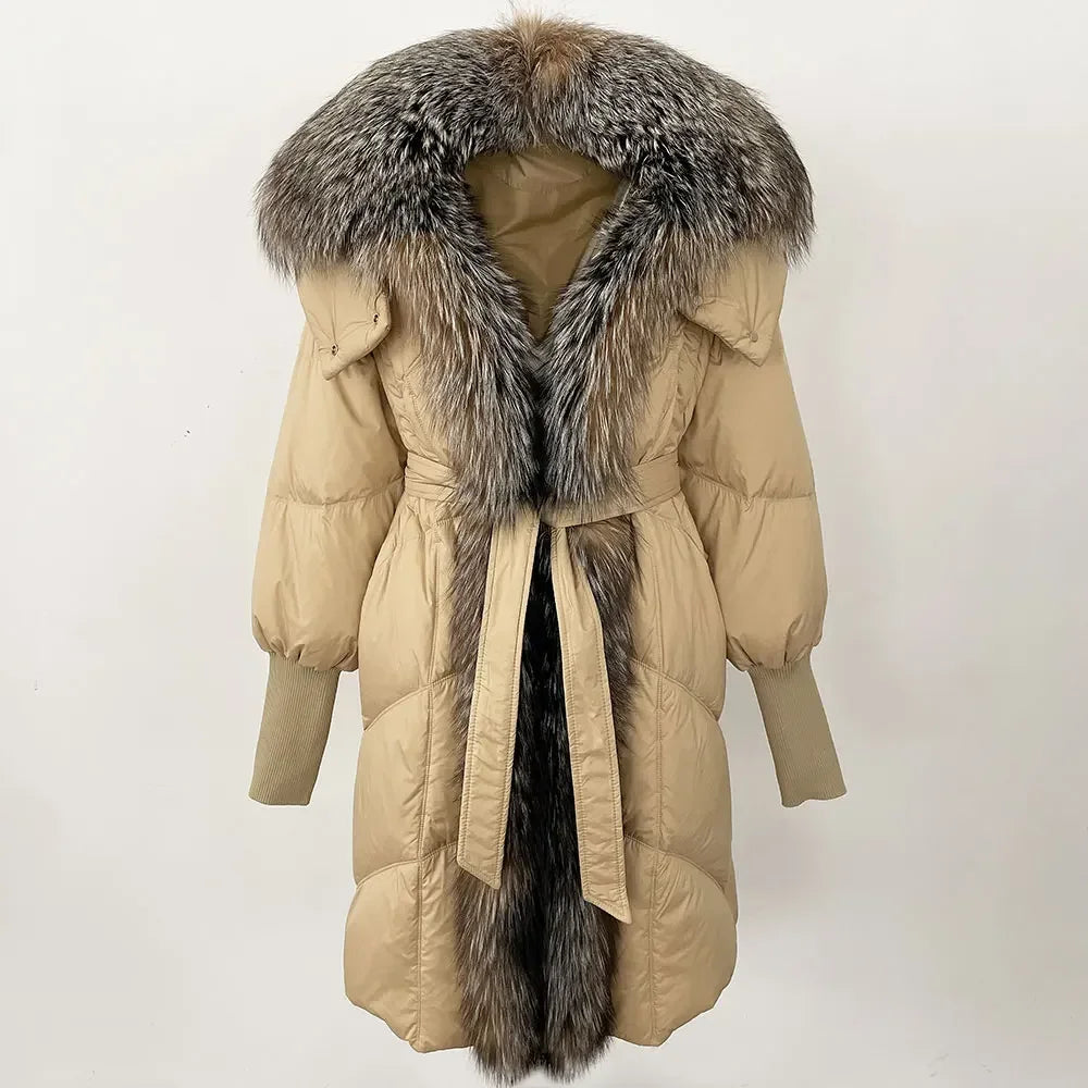 Full-length puffer coat shown straight on, emphasizing wide-waisted fit and quilted insulation