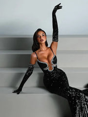 Floor-length black evening dress with square neckline