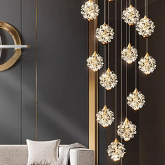 Luxury foyer globe pendant light suspended from a high ceiling