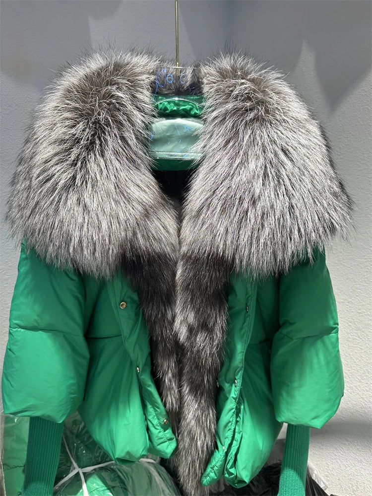 Luxury women’s winter coat with plush fur collar and knit sleeves