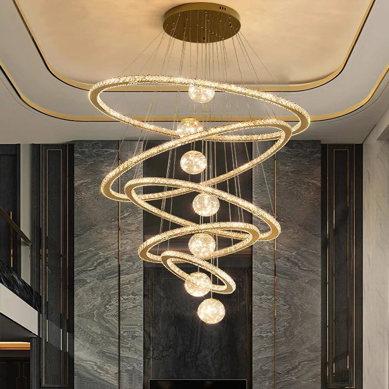 luxury-spiral-crystal-chandelier-living-room hanging from the ceiling in a stylish interior setting.