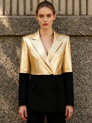 Tailored gold upper and black lower blazer styled for evening
