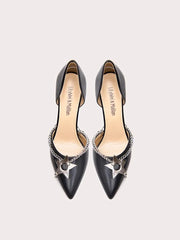 a metal star and chain sandal with a thin heel.