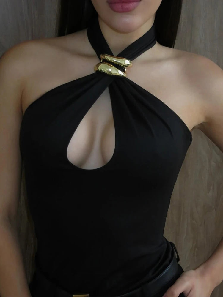 Minimalist black women’s top styled for summer layering