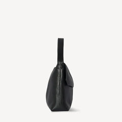 minimalist flap bag with single strap and structured finish
