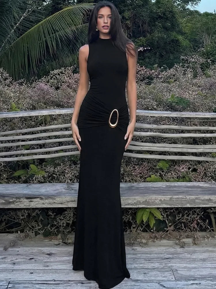 Ruched waist maxi dress styled indoors with a white fireplace backdrop