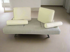 Minimalist modern sofa styled in open living room
