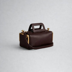 rectangular handbag with top handle and soft structured body