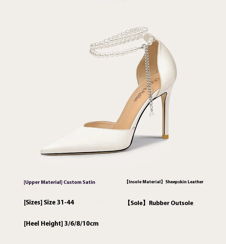 Minimalist white wedding party heels featuring signature pearl detail