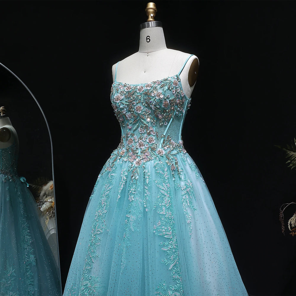 Close-up of the appliqué bodice with delicate sequin detailing