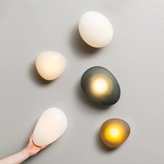 Contemporary bedside LED wall light in colored glass