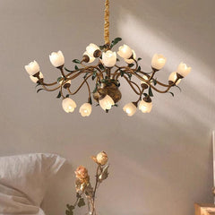 Modern copper botanical chandelier above an entryway table
