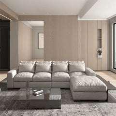 A modern design fabric 3 seat modular sofa set with beige and gray upholstery, arranged in a living room setting with a wooden wall and a large window.