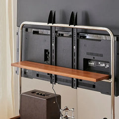 Modern TV cart on casters positioned near a window