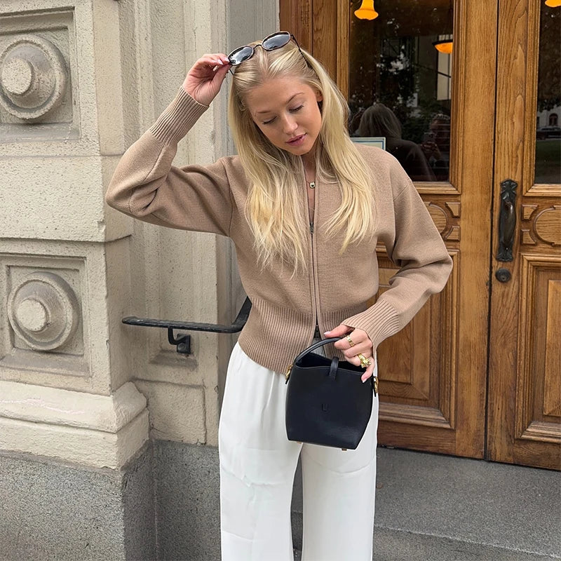 Modern stretchy zip sweater for work or casual layering

