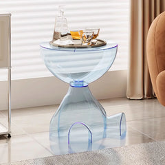 minimalist small coffee table with clear base and soft neutral finish
