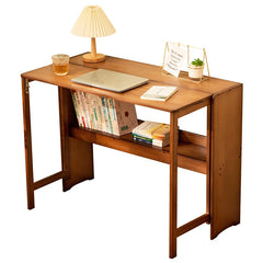 Narrow space-saving desk fitting against a wall in a small room