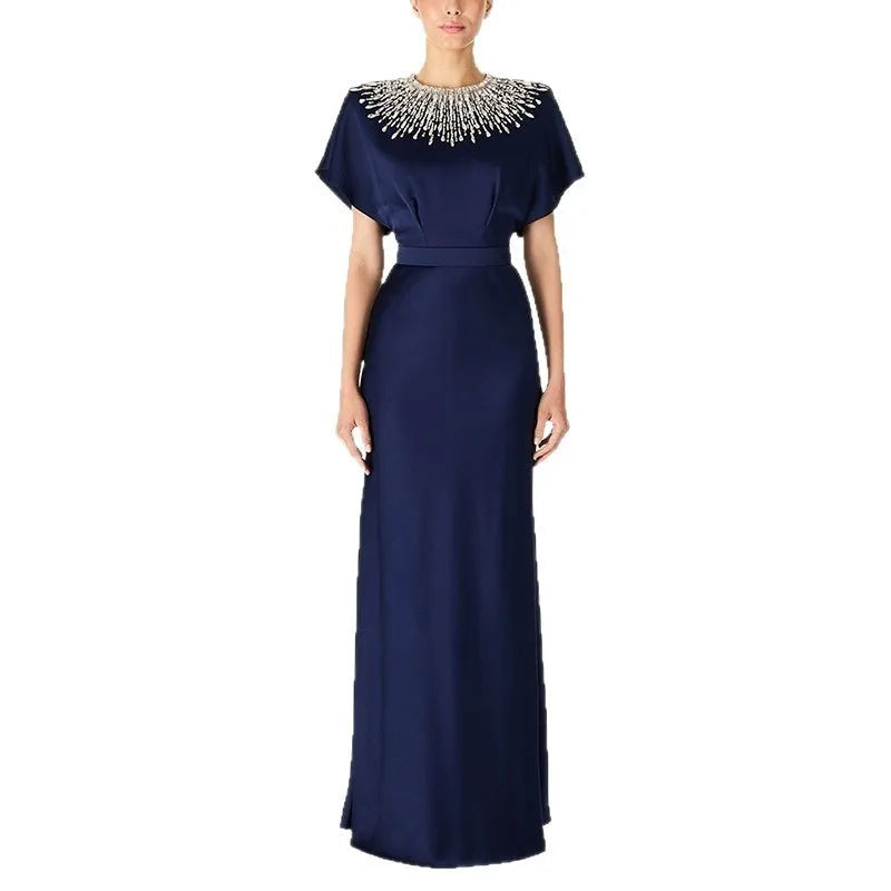 Navy embroidered neck evening gown styled for formal events