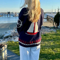 Navy sailboat print cardigan styled for waterfront autumn days