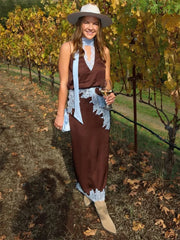 Sleeveless V-neck top paired with an elastic-waist midi skirt set